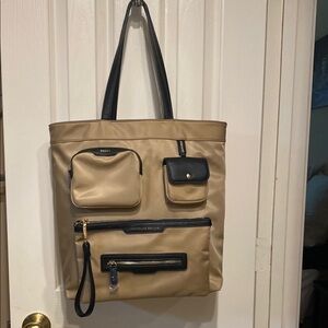 Dream Control tan and black tote bag.